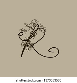 Vector Hand Drawn floral R monogram or logo. Uppercase Hand Lettering. Letter R with Flowers and Branches. Wildflowers. Floral Design