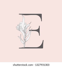 Vector Hand Drawn Flowered E monogram or logo. Uppercase Letter with Rose Flower. Wildflowers. Floral Design