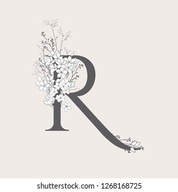 Vector Hand Drawn Flowered R monogram or logo. Uppercase Letter with Flowers and Branches. Wildflowers. Floral Design