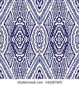 Vector hand drawn geometrical abstract seamless Ikat pattern from decorative ethnic ornament. Blue indigo  tribal elements on a white background. Batik, wallpaper, wrapping, page fill, textile print