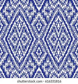 Vector hand drawn geometrical abstract seamless Ikat pattern from decorative ethnic ornament. Blue indigo  tribal elements on a white background. Batik, wallpaper, wrapping, page fill, textile print