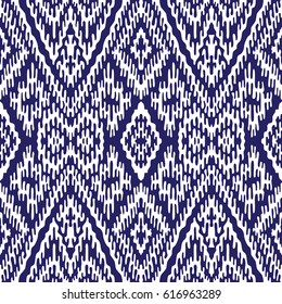 Vector hand drawn geometrical abstract seamless Ikat pattern from decorative ethnic ornament. Blue indigo  tribal elements on a white background. Batik, wallpaper, wrapping, page fill, textile print