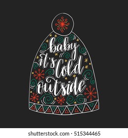 Vector hand drawn greeting card - Baby it's cold outside. Isolated on black background. Colorful festive background, christmas design