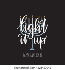Vector hand drawn greeting card - Light it up, Happy Hanukkah. White calligraphy isolated on black background with menorah. Hand lettering illustration. Hanukkah design