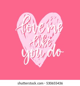 Vector hand drawn greeting card - Love me like you do. Calligraphy poster. Hand lettering illustration. Valentine's Day design