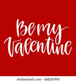 Vector hand drawn greeting card - Be my Valentine.White calligraphy isolated on red background. Valentine's Day design