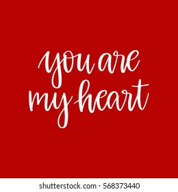 Vector hand drawn greeting card - You are my heart.White calligraphy isolated on red background. Valentine's Day design