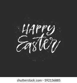 Vector hand drawn greeting card - Happy Easter. Dry brush calligraphy isolated on black background.