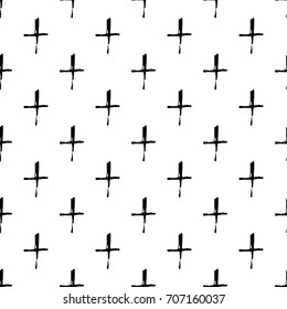 Vector hand drawn grunge seamless pattern with black Christian crosses.