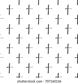 Vector hand drawn grunge seamless pattern with black Christian crosses.