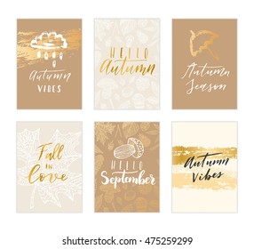 Vector hand drawn "hello September, hello autumn, autumn vibes, fall in love, autumn season" phrases set. Modern calligraphy quote card collection.