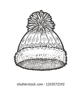Vector hand drawn illustration of Cable Pom-Pom Hat in vintage engraved style. Isolated on white background.