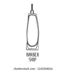 Vector hand drawn illustration of electric hair clipper in vintage engraved style. isolated on white background. Side view.