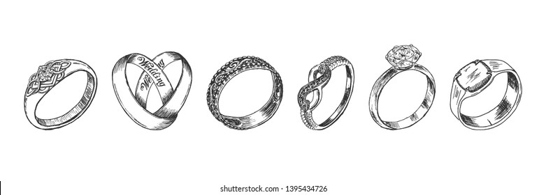 Vector hand drawn illustration of jewelry wedding and engagement rings set in vintage engraved style. Isolated on white background.