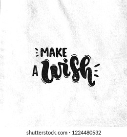 Vector hand drawn illustration. Lettering phrases Make a wish. Idea for poster, postcard.