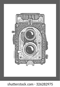 Vector hand drawn illustration of old vintage camera, engraving.