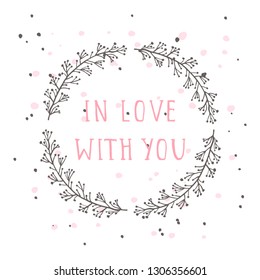 Vector hand drawn illustration of text IN LOVE WITH YOU and floral round frame on white background. Colorful.
