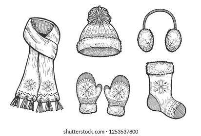 Vector hand drawn illustration of winter accessories: scarf, Fur Headphones, Cable Pom-Pom Hat, mittens and Christmas stocking. Set in vintage engraved style. Isolated on white background.