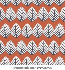 Vector hand drawn leaf motif seamless repeat pattern red background