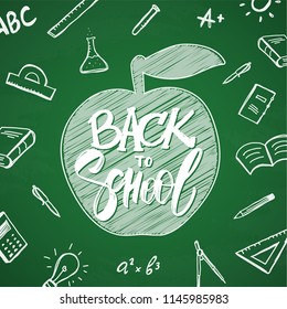 Vector hand drawn lettering of Back to School with apple and doodles supplies on chalkboard background