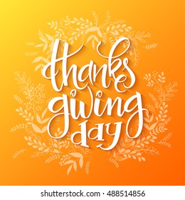 Vector hand drawn lettering - thanksgiving day - with doodle decorative plant branches.