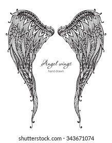 Vector hand drawn ornate angel wings, zentangle style. Doodle black and white illustration