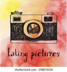 Vector hand drawn retro vintage camera on watercolor background. Taking pictures