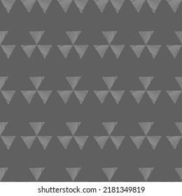 Vector. Hand drawn seamless monochrome grey and white pattern with striped, dotted triangles, dashes, stripes. Mosaic. Repeating geometric texture, geometric shape. Dividers.