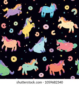 Vector hand drawn seamless pattern of cute unicorns with donuts.