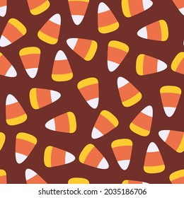 Vector hand drawn seamless pattern with candy corn.Halloween background