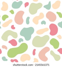 Vector hand drawn seamless pattern in neutral warm colors with various spots for packaging design, textile, wrapping paper, fabric.