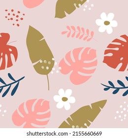 Vector hand drawn seamless pattern with tropical leaves, branches, flowers and dots. Trendy wallpapers, textiles.