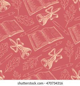 Vector hand drawn seamless pattern with pen, book, leaves and bells on a red  background