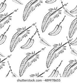 Vector hand drawn seamless pattern. Sketch of  Feathers. Monochrome ink illustration.