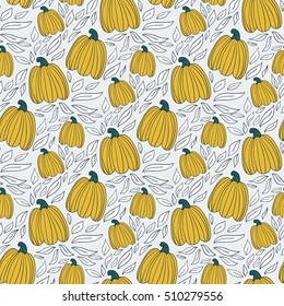 Vector hand drawn seamless pattern with pumpkins and leaves. Autumn background