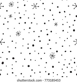 Vector hand drawn seamless pattern with dots and snowflakes. Abstract doodle hand drawn shapes. For wallpaper, print and posters.