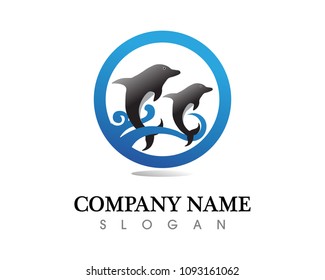 vector hand drawn set of cartoon dolphins in different poses
