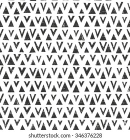 Vector hand drawn tribal pattern with triangles. Seamless geometric background with grunge texture. EPS10 vector illustration. Contains no transparency and blending modes. 