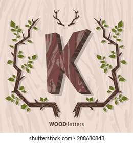 Vector hand drawn vintage Wooden Monogram with amazing frame of branches. Letter "K" can be used for posters, cards, invitations, blogs, websites, backgrounds and any other stylish designs