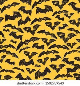 Vector hand drawn yellow halloween bats repeat pattern. Suitable for textile, wallpaper, halloween party poster or gift wrap.