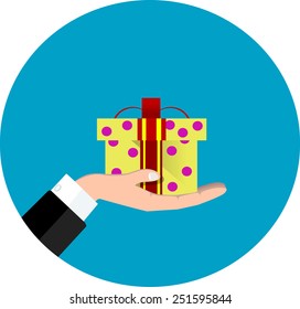 Vector hand giving present in flat style - gift concept illustration