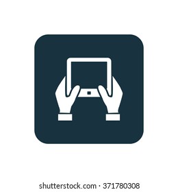 Vector hand holding tablet Icon