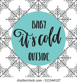 Vector hand lettering - Baby it's cold outside, with snowflakes background. Holiday banner. Winter backdrop. Christmas design. Calligraphy poster