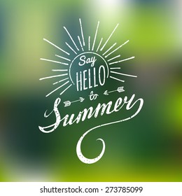 Vector hand lettering inspirational typography poster Say hello to summer on blurred background