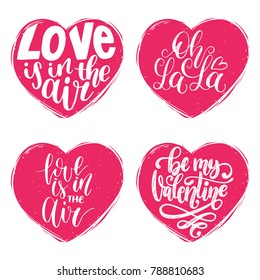 Vector hand lettering phrases Love Is In The Air, Oh La La etc. February 14 calligraphy in heart shapes. Valentines day typography.