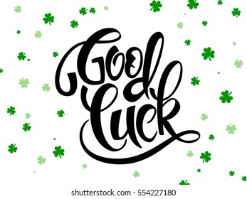 vector hand lettering saint patrick's day greetings text with clover shapes.