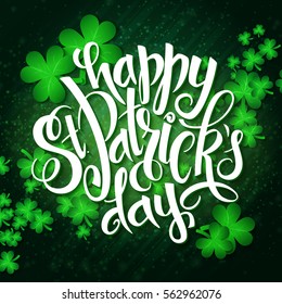 vector hand lettering saint patrick's day greetings card with clover shapes and branches.