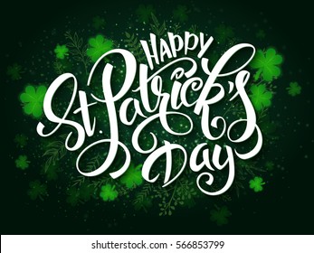 vector hand lettering saint patrick's day greetings card with clover shapes and branches.