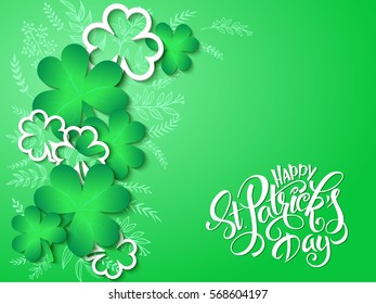 vector hand lettering saint patrick's day greetings card with clover shapes and branches