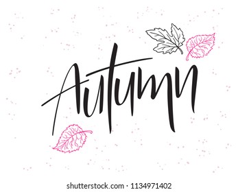 vector hand lettering text about autumn with doodle leaves and dots.